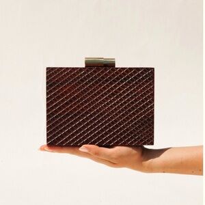 Ramla Siena – The Architecture of Elegance Wood Textured Clutch / Bag